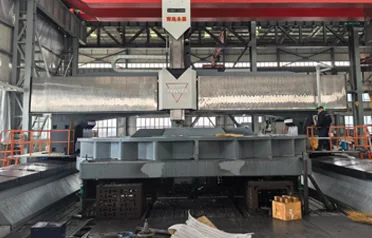 大型 CNC ガントリーフライス盤はどのようにして重量部品の加工を容易にすることができるのでしょうか?唐山裕興機械のカスタマイズ設備が無事に組み立てられました